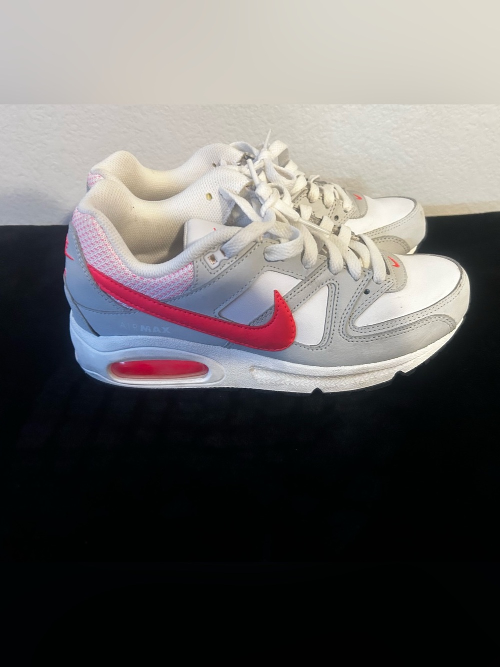 Nike White and Gray Sneakers with Pink Swoosh